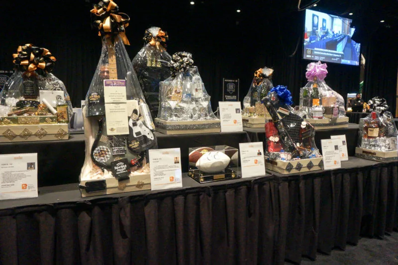 Fundraising auction items on display